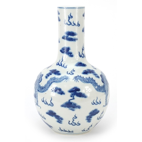 103 - Chinese blue and white porcelain vase hand painted with dragons chasing a flaming pearl amongst clou... 
