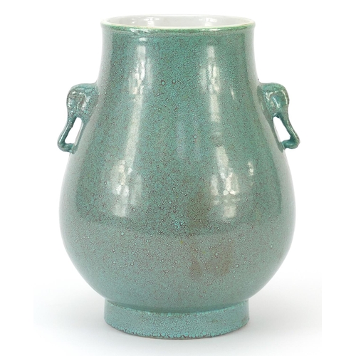 226 - Chinese porcelain hu arrow vase with animalia handles having a spotted turquoise glaze, 19cm high
