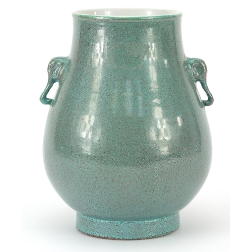 226 - Chinese porcelain hu arrow vase with animalia handles having a spotted turquoise glaze, 19cm high