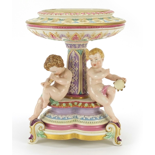 162 - Royal Worcester, Victorian porcelain centrepiece surmounted with three children with instruments, 28... 