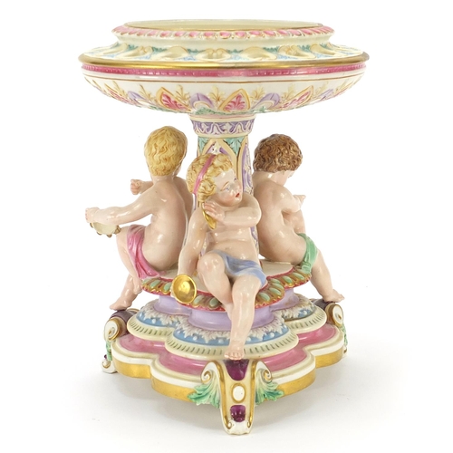 162 - Royal Worcester, Victorian porcelain centrepiece surmounted with three children with instruments, 28... 