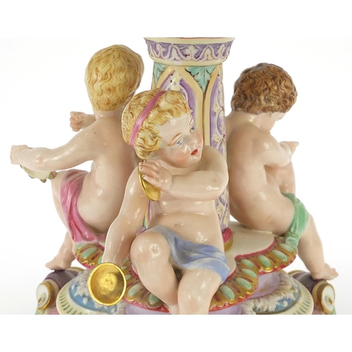 162 - Royal Worcester, Victorian porcelain centrepiece surmounted with three children with instruments, 28... 