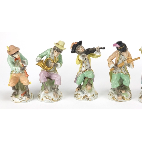 66 - Dresden, set of twelve German porcelain monkey band musicians, each with various numbers to the base... 