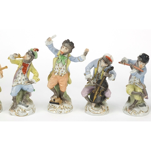 66 - Dresden, set of twelve German porcelain monkey band musicians, each with various numbers to the base... 