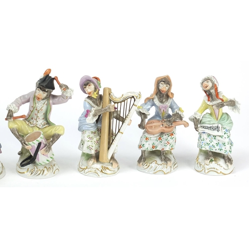 66 - Dresden, set of twelve German porcelain monkey band musicians, each with various numbers to the base... 