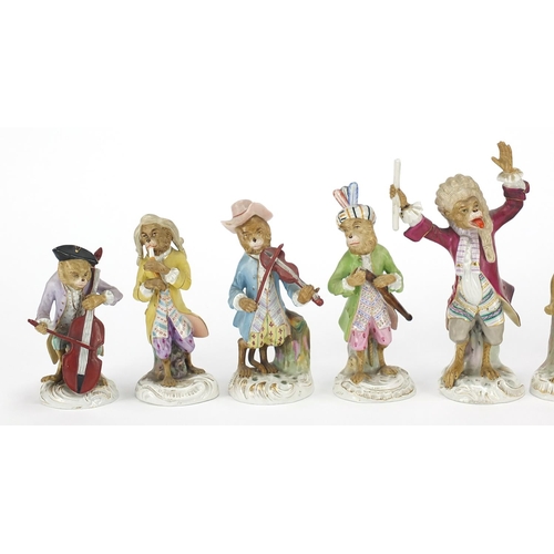 67 - Set of nine German porcelain monkey band musicians, each with various numbers to the base, the large... 