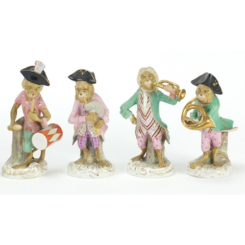 67 - Set of nine German porcelain monkey band musicians, each with various numbers to the base, the large... 