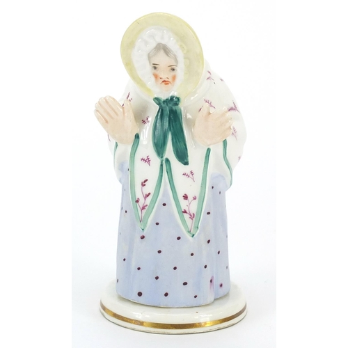140 - 19th century Derby porcelain granny candle snuffer with stand, 11cm high