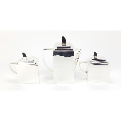 94 - Modernist silver plated tea set on tray in the style of Christopher Dresser with ebonised knops, 38.... 