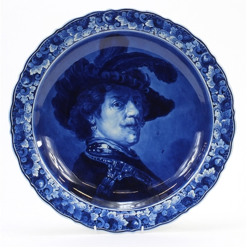 272 - Large Delft charger decorated with a portrait of Rembrandt, 42cm in diameter