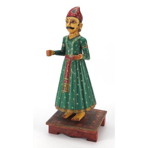 416 - Indian painted carved wood figure, 45cm high