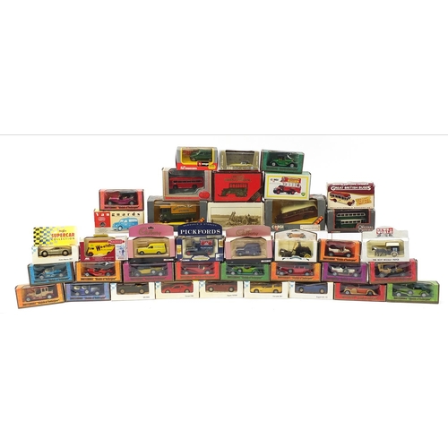 1981 - Collection of diecast vehicles with boxes, some advertising, including Corgi, Vanguards and Maisto S... 