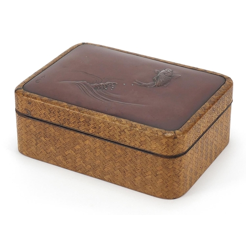 130 - Japanese hardwood and lacquer container with inset metal plaque depicting a Koi, 5.5cm H x 14.5cm W ... 