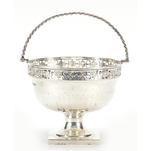 2160 - Thomas Bradbury & Sons Ltd, George V silver pedestal dish with swing handle, Sheffield 1923, 9cm hig... 