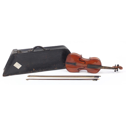 1912 - Old wooden violin with case and two bows, the violin bearing an Antonius, Stradinarius paper label, ... 