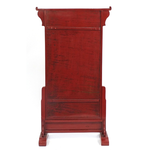 702 - Chinese floor standing red lacquered screen decorated in relief and gilded with calligraphy, 157.5cm... 