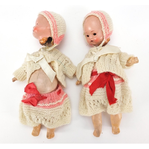 1942 - Two miniature bisque head dolls with open and close eyes, 20cm high