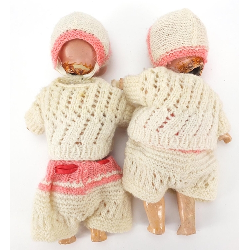 1942 - Two miniature bisque head dolls with open and close eyes, 20cm high