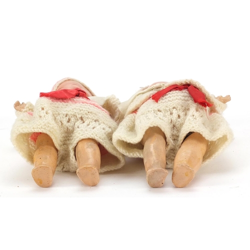 1942 - Two miniature bisque head dolls with open and close eyes, 20cm high