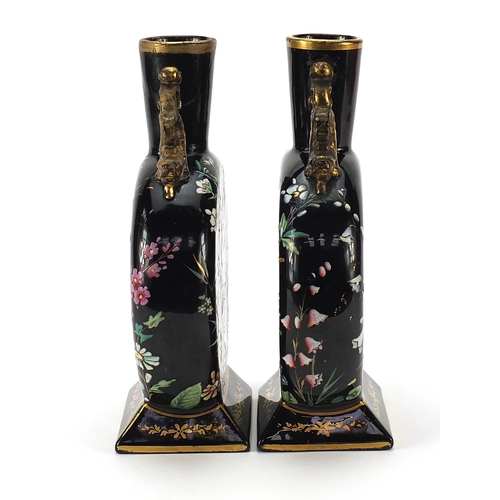 74 - Attributed to Moser, pair of Bohemian glass moon flasks enamelled with birds amongst flowers, each 2... 