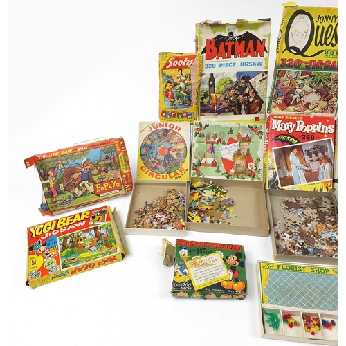 1913 - Collection of vintage jigsaw puzzles including Batman, Popeye, Yogi Bear, Disneyland and Sooty