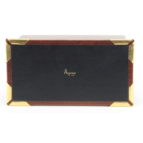 407 - Asprey tooled tan leather letter rack with brass mounts, 9cm H x 15.5cm W x 8.5cm D