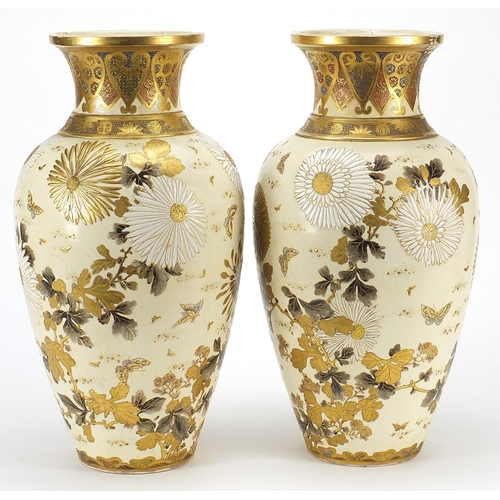 259 - Large pair of Japanese Satsuma pottery vases hand painted with flowers, character marks to the bases... 