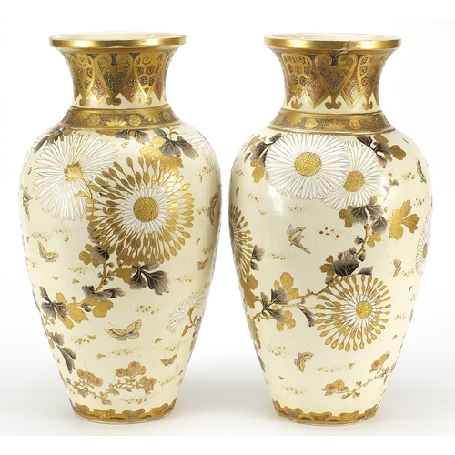 259 - Large pair of Japanese Satsuma pottery vases hand painted with flowers, character marks to the bases... 