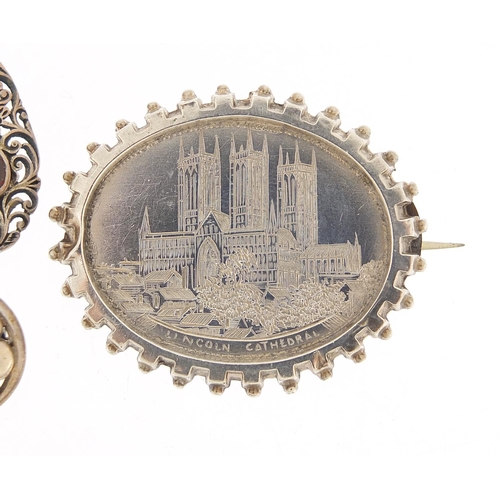2806 - Victorian and later silver jewellery comprising Lincoln Cathedral brooch, Art Nouveau design brooch ... 