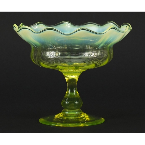 106 - Art Nouveau Vaseline glass pedestal bowl with frilled rim, 12.5cm high x 15cm in diameter