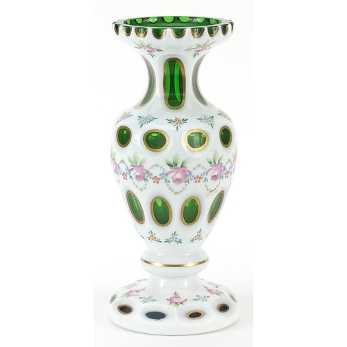 265 - 19th century Bohemian white overlaid green glass vase hand painted flowers, 23cm high