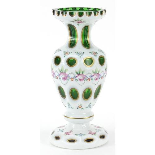 265 - 19th century Bohemian white overlaid green glass vase hand painted flowers, 23cm high