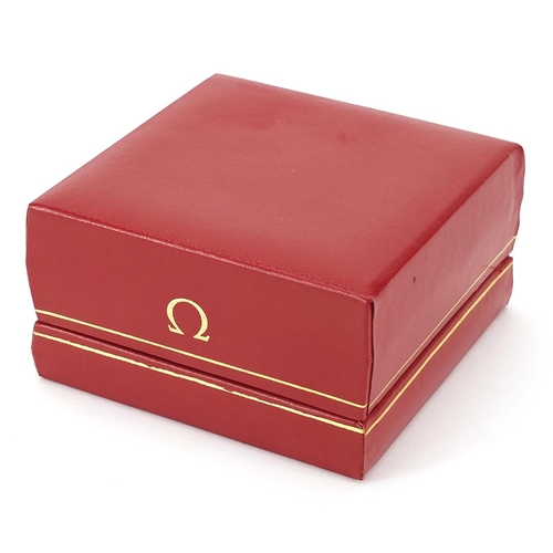 2777 - Omega, red leatherette wristwatch box with cardboard outer box, 5.5cm H x 10cm W x 10cm D