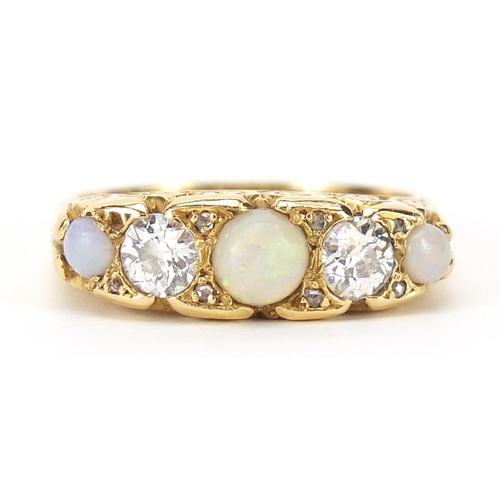2253 - Antique 18ct gold cabochon opal and diamond five stone ring with pierced and scrolled setting, total... 