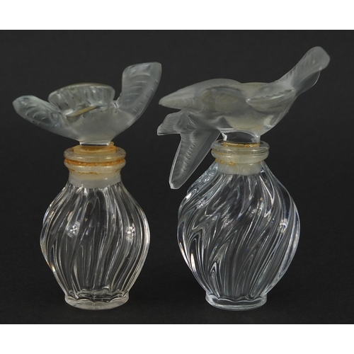 75 - Two Lalique Nina Ricci frosted and clear glass scent bottles, 7cm high