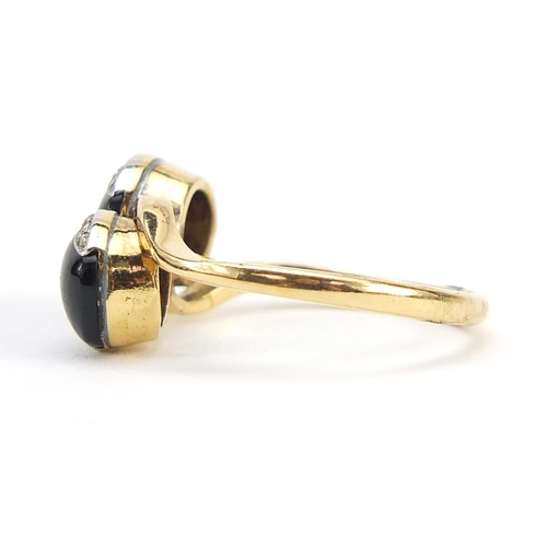 2256 - 18ct gold black onyx and diamond crossover ring, size L, 4.2g