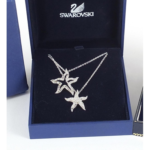 2794 - 9ct gold locket on a 9ct gold necklace 1.8g and a Swarovski Crystal starfish necklace