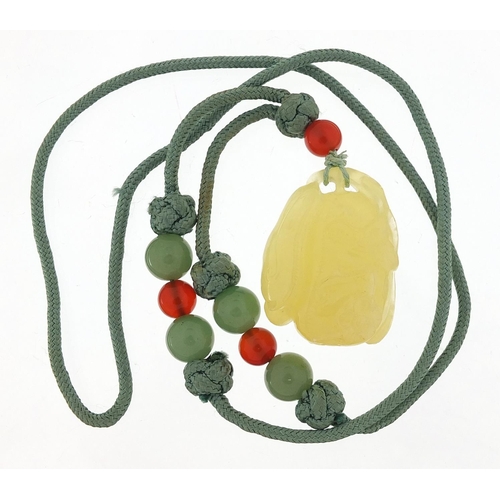 2784 - Chinese carved stone necklace, 70cm in length, 47.5g