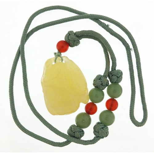 2784 - Chinese carved stone necklace, 70cm in length, 47.5g