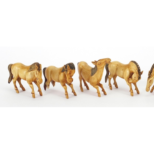 145 - Set of eight Chinese carved ivory horses of Wang Mu, each approximately 6.5cm wide