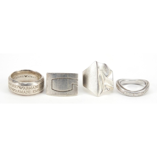 2803 - Four designer silver rings including Emporio Armani, various sizes, 53.8g