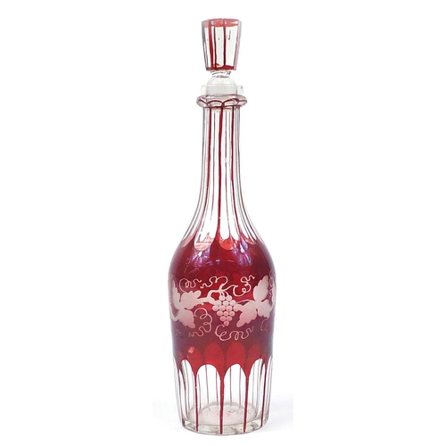 152 - Bohemian ruby overlaid glass decanter etched with leaves and berries, 33cm high