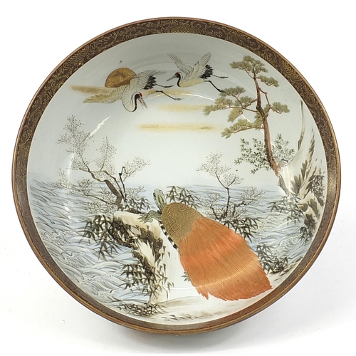 263 - Large Japanese Kutani porcelain bowl hand painted with a tortoise and cranes, character marks to the... 