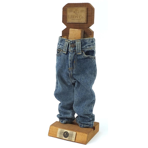 237 - Leon Co Jeanswear advertising wooden display stand, 48.5cm high