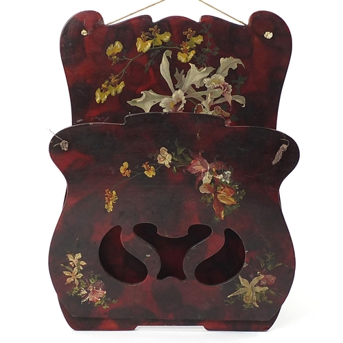 409 - Red lacquered wall hanging letter rack hand painted with flowers, 39cm high