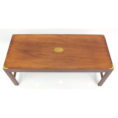 692 - Campaign style mahogany coffee table with brass mounts, 43cm H x 46cm W x 107cm D