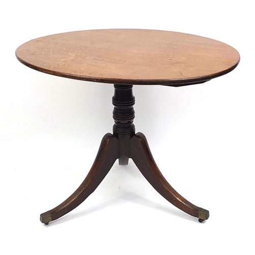 690 - Victorian walnut and mahogany tilt top table with tripod base and brass casters, 73cm H x 95cm W x 7... 