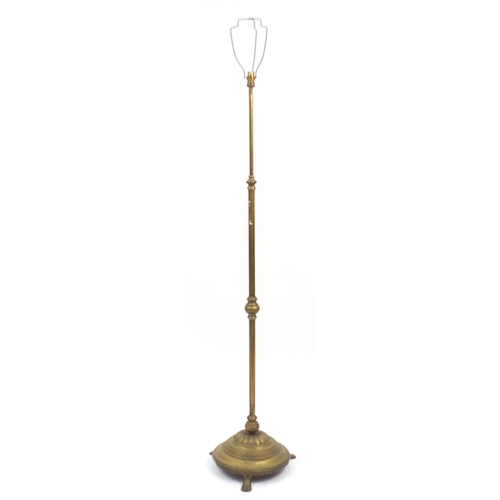 683 - Victorian brass adjustable standard lamp with paw feet, 148cm high when extended