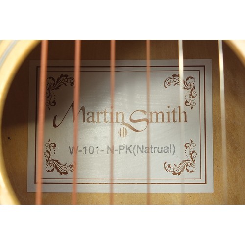 1995 - Martin Smith six string acoustic guitar, model W-101-N-PK, with carry case