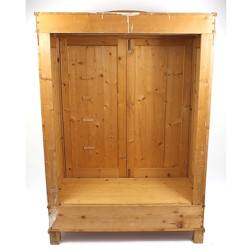 696 - **WITHDRAWN**European stripped pine wardrobe, 200cm H X 132cm W x 61cm D